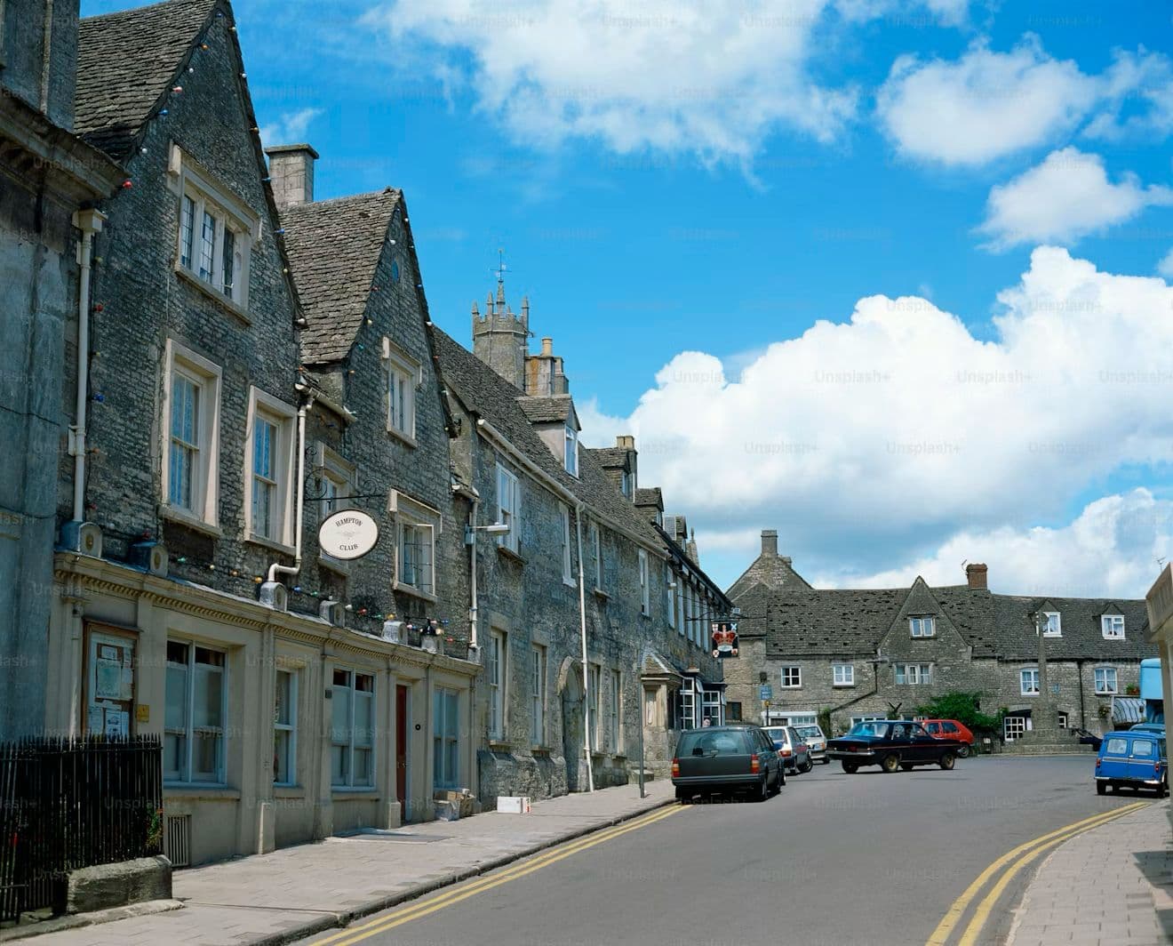 Cotswold village road on a Dragon and Rose tour